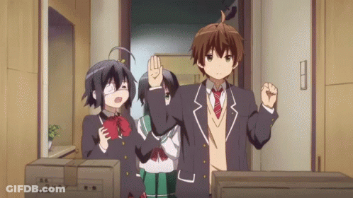 Anime Characters High-Fiving In Room With Boxes GIF