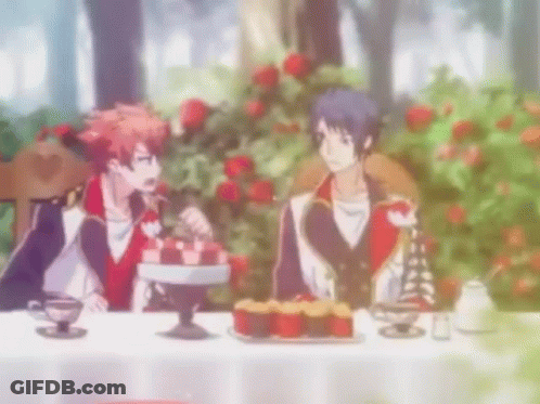 Anime Couple Sitting At Table With Cupcakes GIF