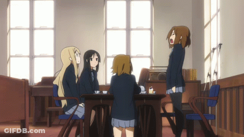 Anime Girls Sitting Around A Table Talking GIF