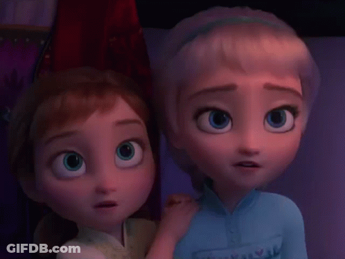 Anna And Elsa Are Looking At Each Other With Their Eyes Closed . GIF