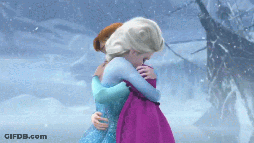 Anna And Elsa From Frozen Hugging In Snow GIF