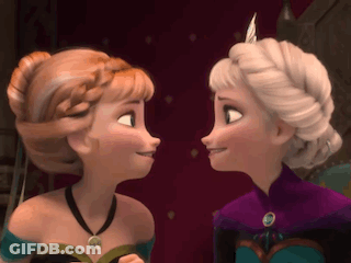 Anna And Elsa Smiling At Each Other GIF