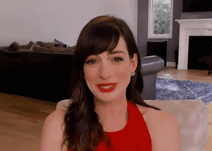 Anne Hathaway Covering Her Mouth GIF