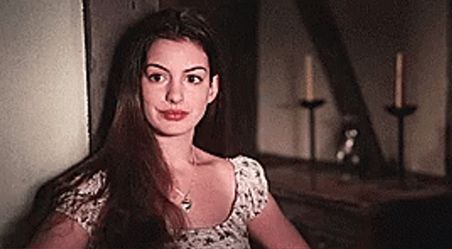 Anne Hathaway Raising Her Eyebrows GIF