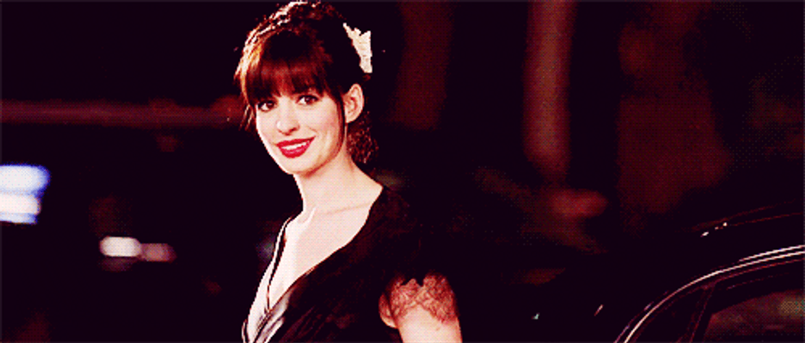 Anne Hathaway Staring Winking GIF