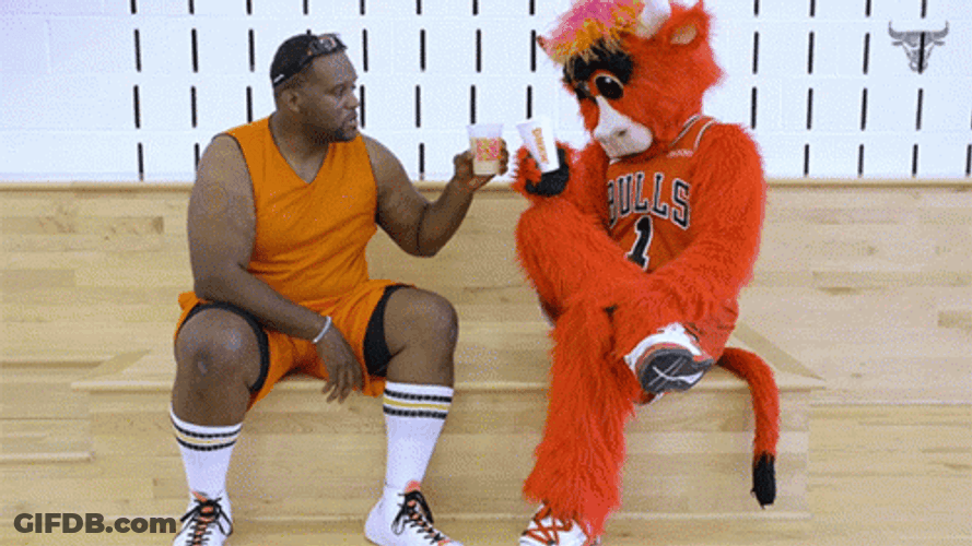 Anthony Adams Drinking With A Mascot GIF