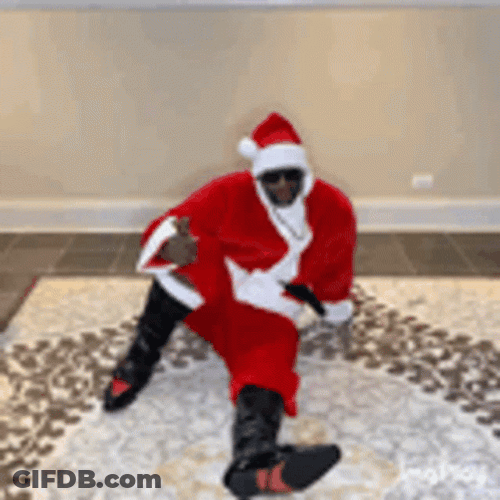 Anthony Adams Wearing Santa Claus Costume GIF