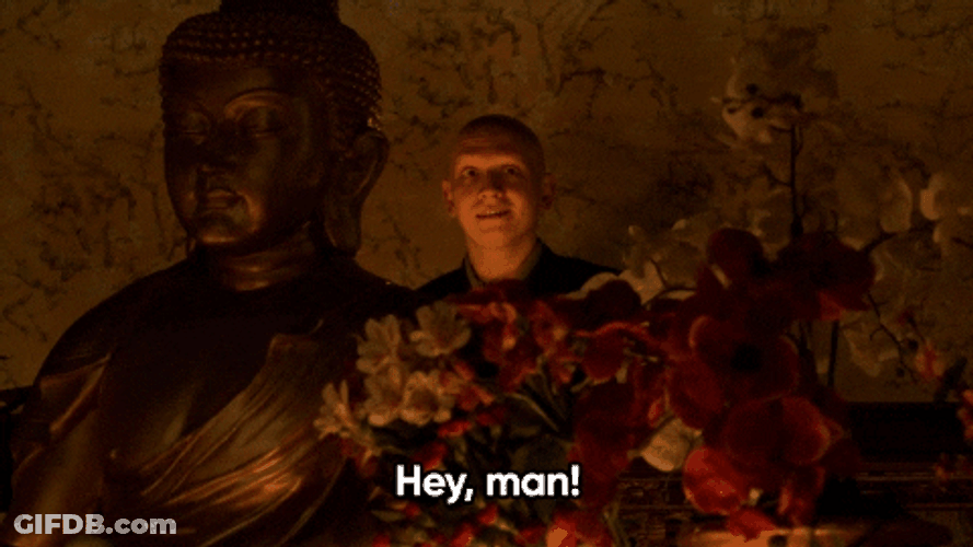 Anthony Carrigan Standing Beside Buddha Gulp GIF