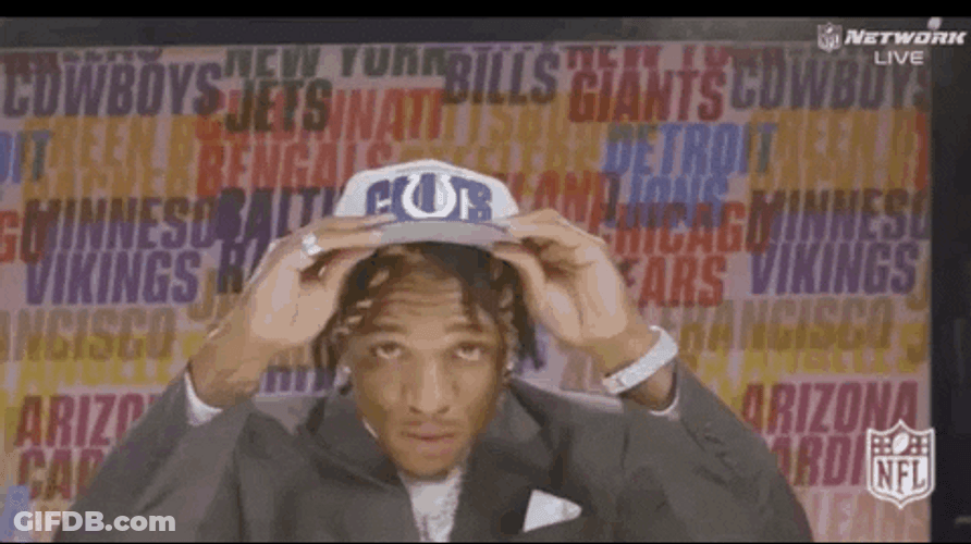 Anthony Richardson Fixing His Cap And Coat GIF