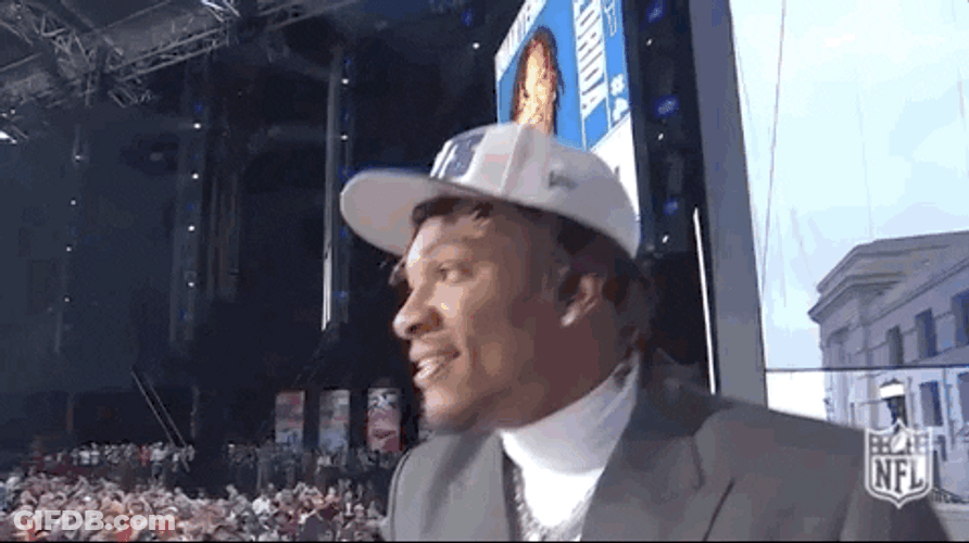 Anthony Richardson Waving To Audience From Stage GIF