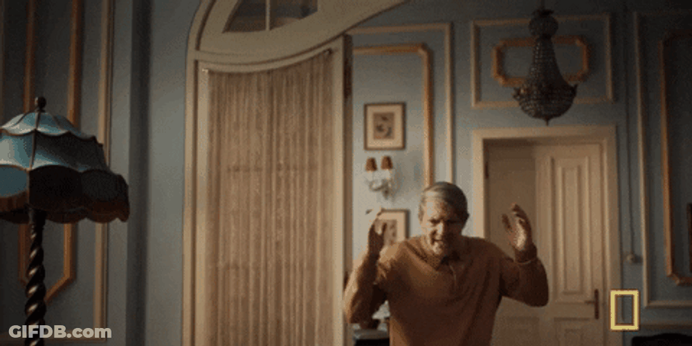 Antonio Banderas Hands Up Surrender GIF
