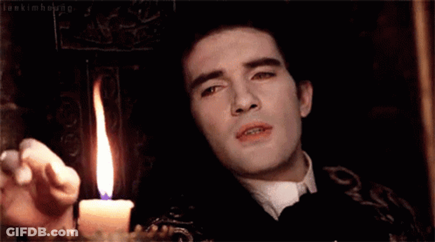 Antonio Banderas Touching The Candle Fire GIF
