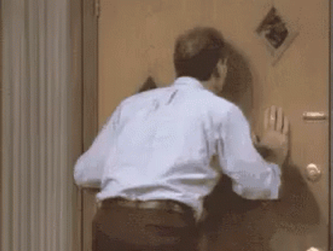 Anxiously Waiting Behind The Door GIF