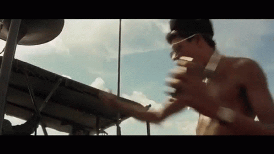 Apocalypse Now Scene Man Dancing In The Music GIF