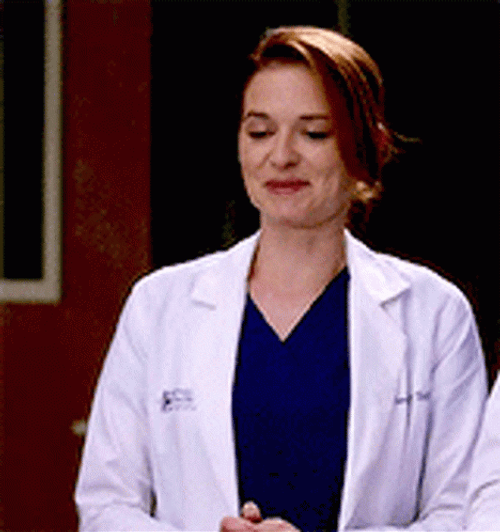 April Kepner Trying Not To Laugh GIF