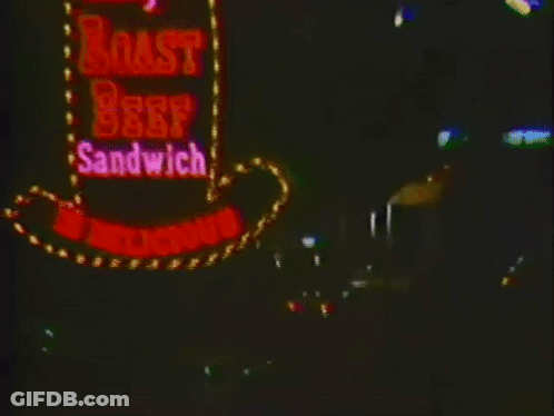 Arby's Roast Beef Sandwich Sign Lit Up At Night GIF
