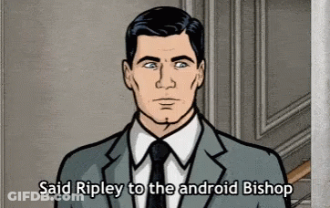Archer Says Ripley To The Android Bishop While Wearing A Suit And Tie GIF
