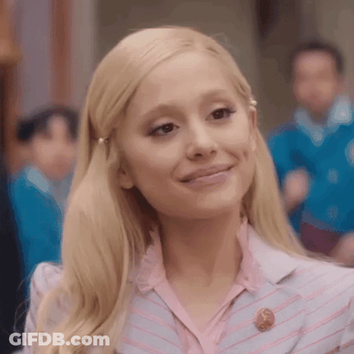 Ariana Grande In Pink And Blue Striped Outfit GIF