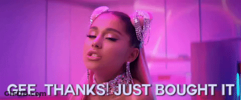 Ariana Grande Is Wearing A Headband With Rhinestones On It And A Choker . GIF