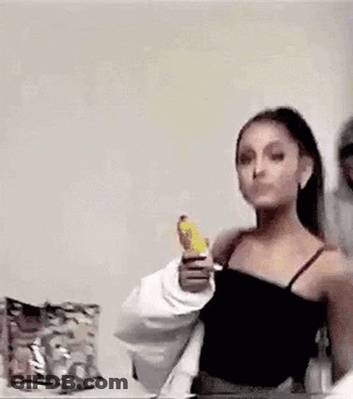 Ariana Grande Showing Bread Knife GIF