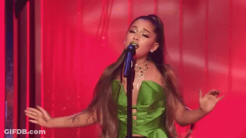 Ariana Grande Singing On Stage In Green Dress GIF
