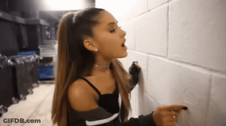 Ariana Grande Talking To A Wall GIF