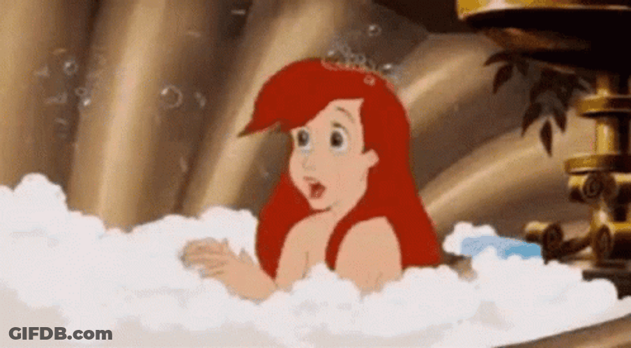 Ariel Blows Bubbles While Having Bubble Bath GIF