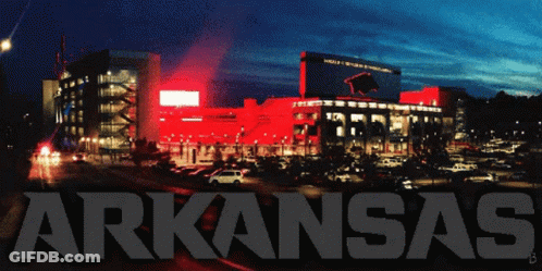 Arkansas In Black Letters On Dark Background GIF