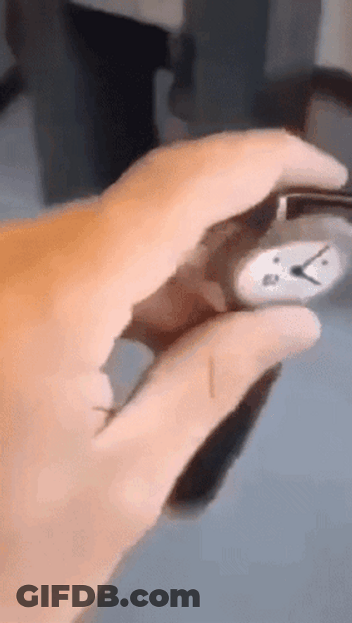 Arm Wearing Big Wrist Watch GIF