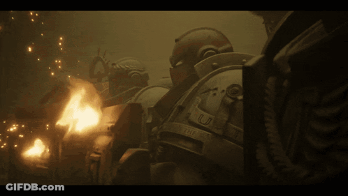 Armored Man Standing Before Fire With Flame GIF