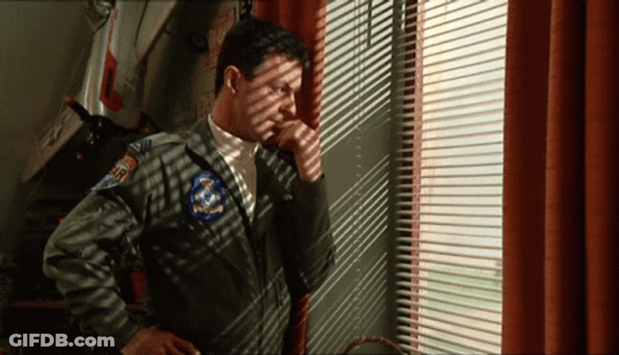 Army Aviator Looking Out The Window GIF