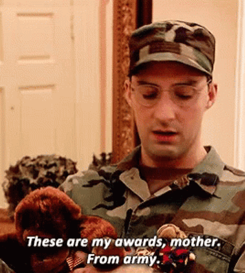 Army Soldier Showing Awards GIF