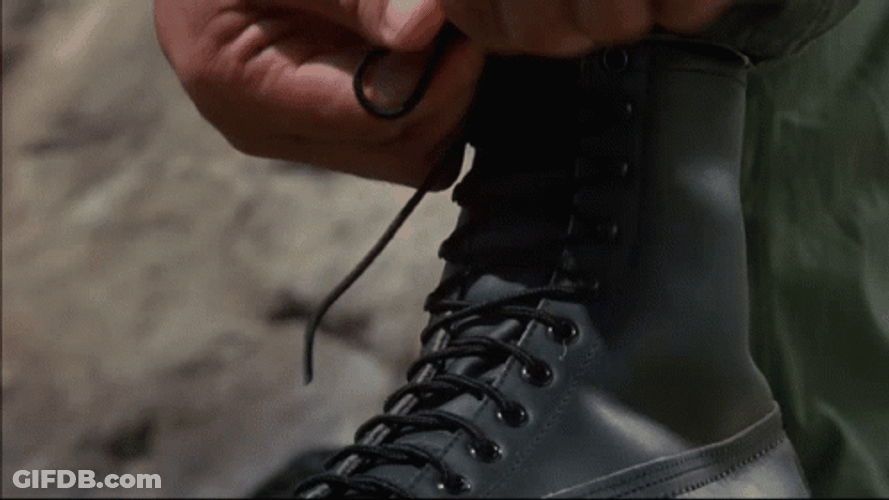 Arnold Schwarzenegger Getting Ready For Combat GIF