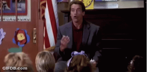 Arnold Schwarzenegger Is Giving A Speech To A Group Of Children In A Classroom . GIF