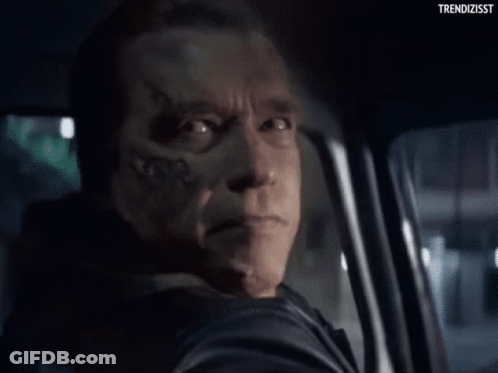 Arnold Schwarzenegger Making Funny Face In Car GIF