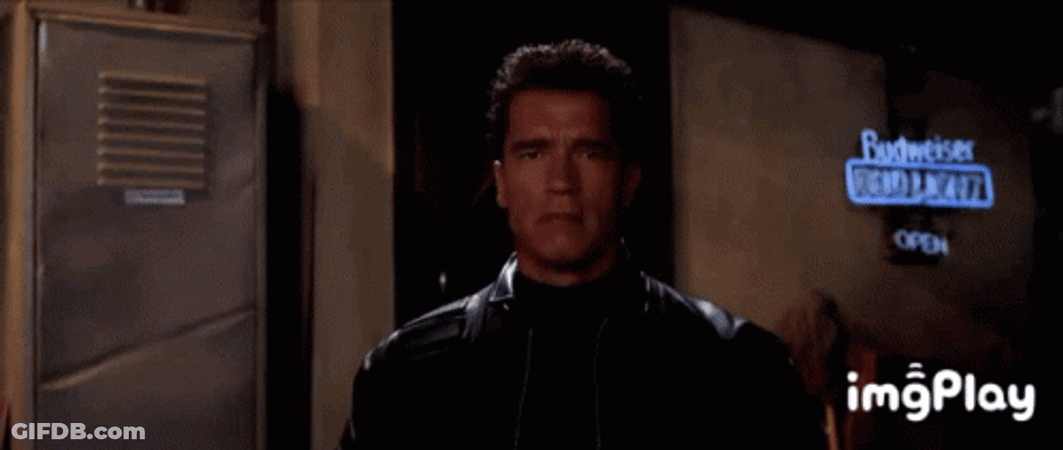 Arnold Schwarzenegger Putting On Eyeglass GIF