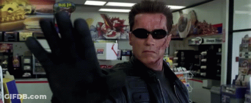 Arnold Schwarzenegger Wearing Sunglasses And Glove GIF