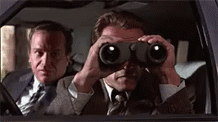Arnold Shwarzenegger Looking At Binoculars GIF