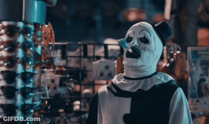 Art The Clown Blows Ribbon Out Mouth GIF
