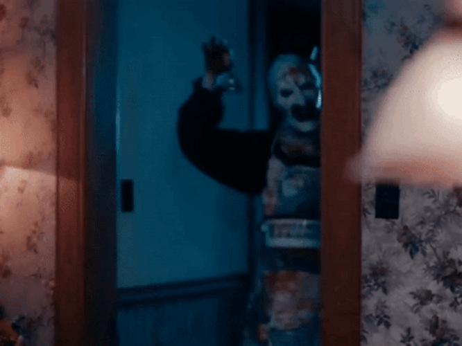 Art The Clown In Bloody  Apron From Kitchen GIF
