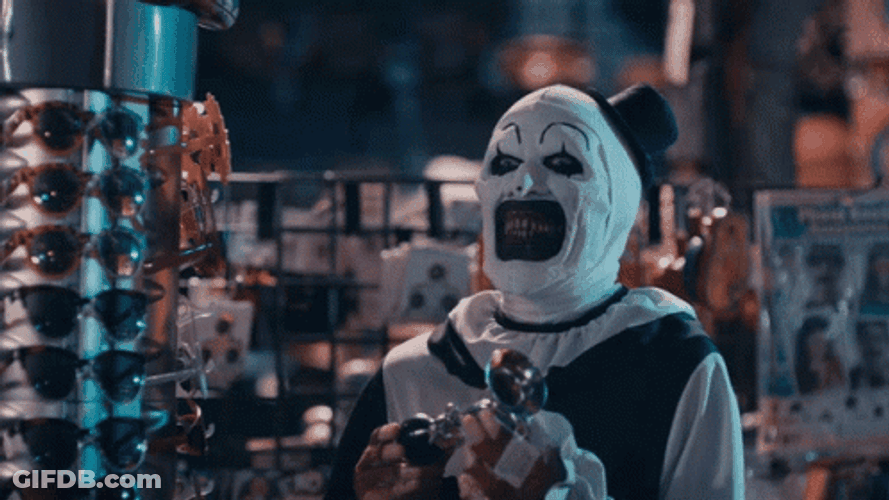 Art The Clown Slowly  Approaches Girl In Store GIF