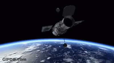 Artist Impression Of Space Shuttle Orbiting Earth GIF