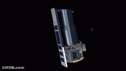 Artist Impression Of Space Telescope Flying In Space GIF