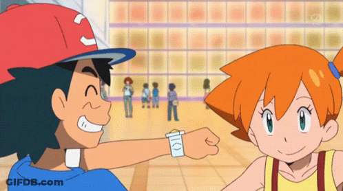 Ash And Misty Standing Next To Each Other GIF