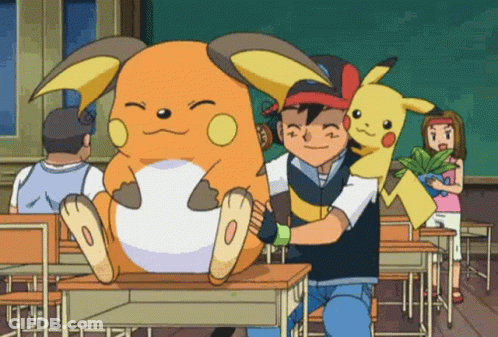 Ash And Pikachu Hugging In Classroom With Pokémon On Desk GIF