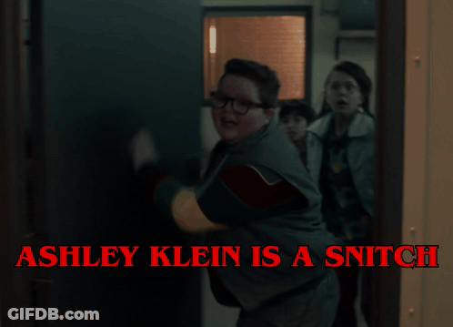 Ashley Klein Is A Snitch Is Written On A Poster GIF