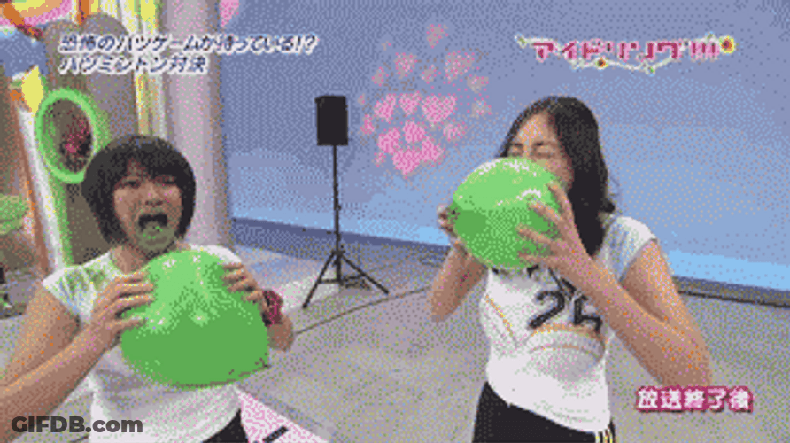 Asian Girls Blowing Balloons GIF