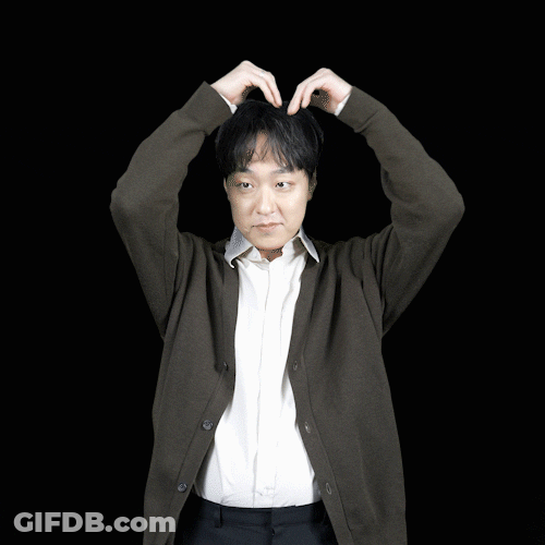 Asian Man Forms Big Heart With Hands GIF