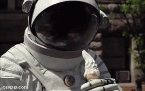 Astronaut Eating Ice Cream Cone GIF