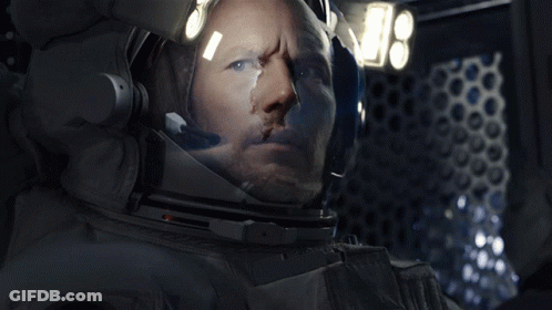 Astronaut Helmet Reflecting Moon GIF